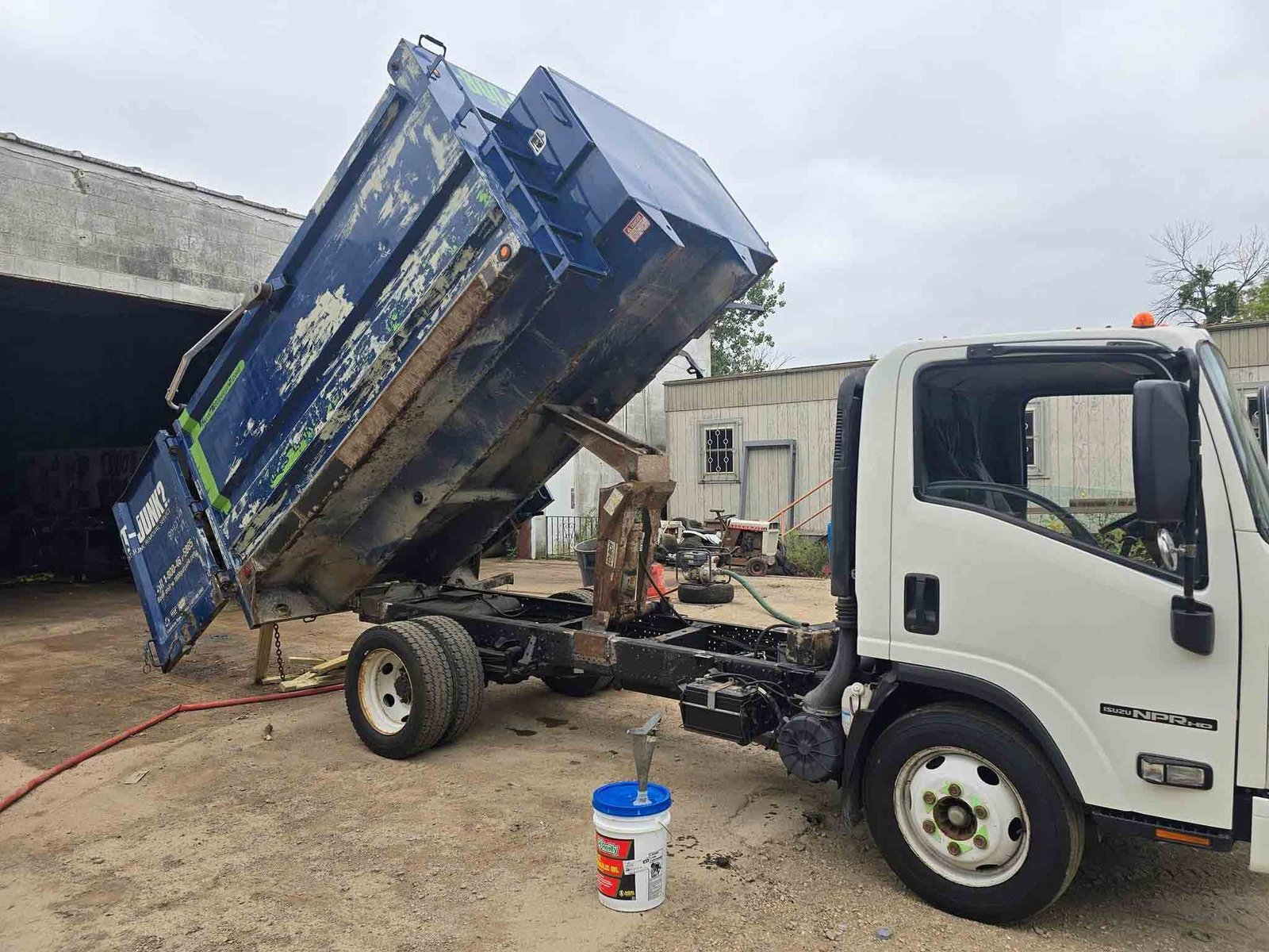 TCB Metal Works Isuzu NPR dump truck with custom fabricated bed