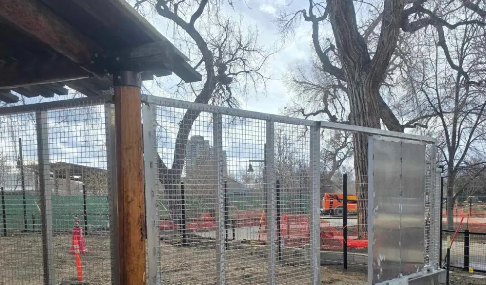 A complete zoo enclosure system — roof structure, welded mesh walls and keeper door, fabricated by TCB Metal Works